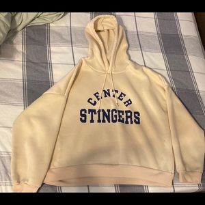 Cream colored pullover hoodie